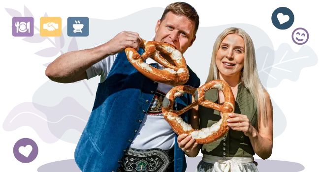 Two itelio employees in costume with doused pretzels against a blue background.