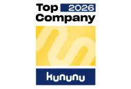 Kununu Auszeichnungsschild für Top Unternehmen 2026 mit gelbem Design.